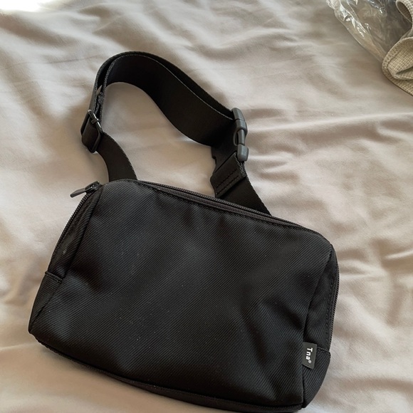 TNA Handbags - TNA crossbody bag with adjustable strap in black